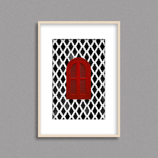 Tableau décoratif d'une fenêtre marocaine en rouge, sur un fond de zellige marocain en noir et blanc, encadré dans un cadre en bois - Format A3