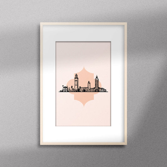 Tableau décoratif illustrant monuments emblématiques du Maroc sur un fond rose pale, encadré dans un cadre en bois - Format A3.