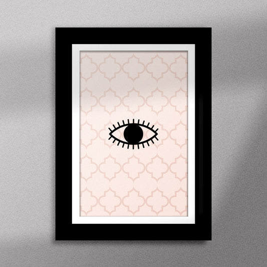Tableau décoratif d'une œil, un symbole berbère ancien, encadré dans un cadre noir - Format A5.