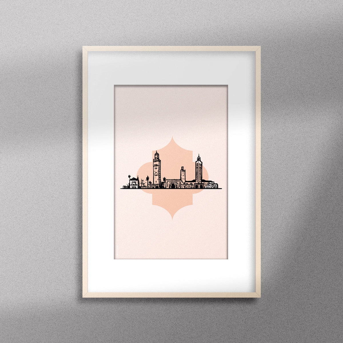 Tableau décoratif illustrant monuments emblématiques du Maroc  sur un fond rose pale, encadré dans un cadre en bois - Format A3.